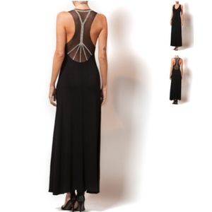 🆕 Fierce beaded back black maxi gown❤️